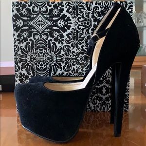 Black faux suede platform heels.